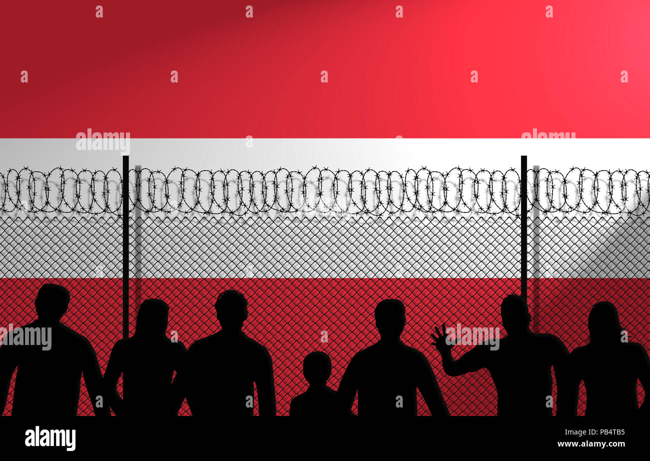 People in front of a secured fence. Austrian flag behind Stock Photo