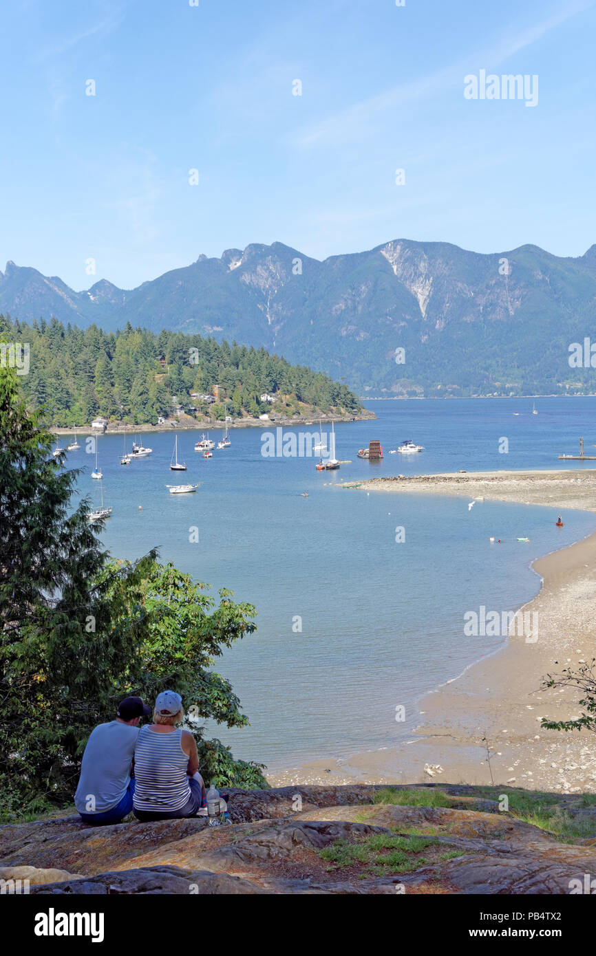 View of Deep Bay, Howe Sound and the Coast Mountains from  Bowen Island near Vancouver, British Columbia, Canada Stock Photo