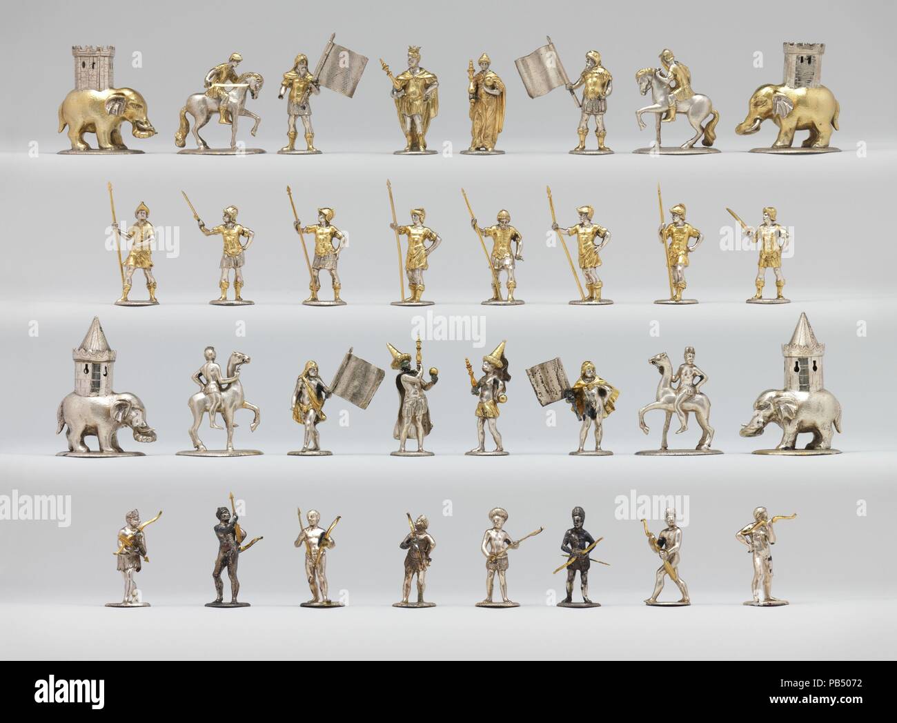 Chessmen (32) and box-board. Culture: German. Designer: Design attributed to Andreas Schluter, Danzig and the Court of Berlin. Dimensions: Height (each king): 3 in. (7.6 cm);  Height (each pawn): 2 in. (5.1 cm);  Overall (board): 3 3/4 × 17 1/8 × 17 1/8 in. (9.5 × 43.5 × 43.5 cm). Maker: Friederich Donaleitis (Konigsberg). Date: late 18th century.  The pieces and the board they came with were probably made by Friederich Donaleitis of Königsberg in 1778 from a seventeenth-century prototype. The bases are boldly engraved with numbers from 1 to 32 on the underside. It has been thought that the se Stock Photo