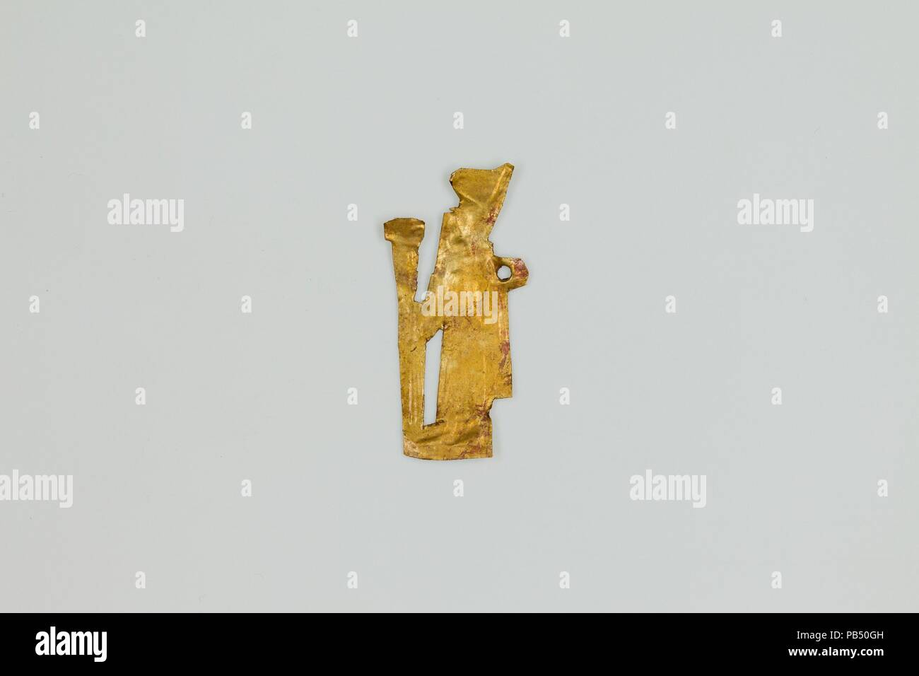 Neith (?) amulet. Dimensions: l. 2.3 cm (7/8 in.) × h. 1.1 cm (7/16 in.). Dynasty: Dynasty 26-29. Date: 664-380 B.C.. Museum: Metropolitan Museum of Art, New York, USA. Stock Photo