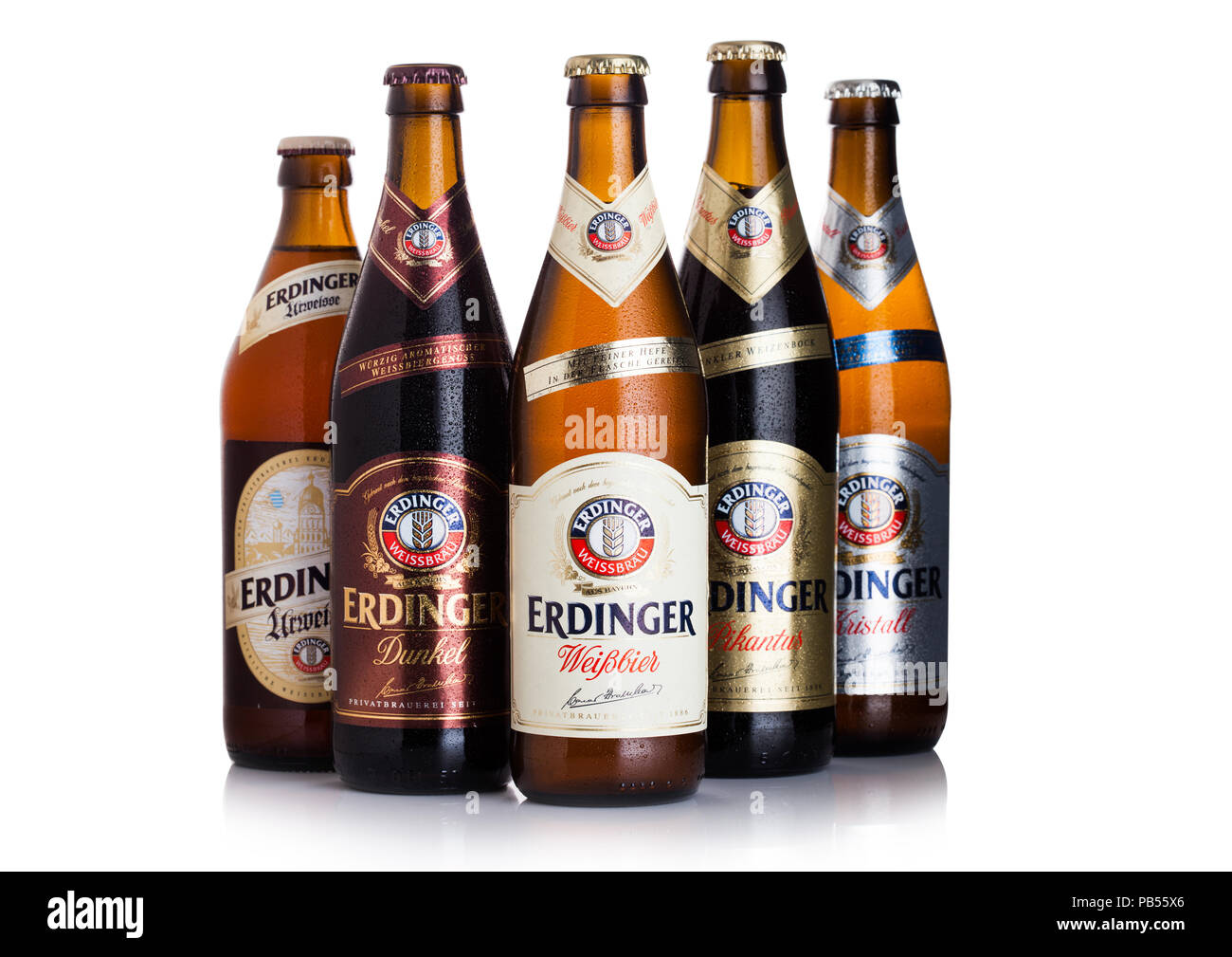 LONDON, UK - JULY 28, 2018: Bottles of Erdinger beer on white background.Erdinger is the product of the world's largest wheat beer brewery. Stock Photo