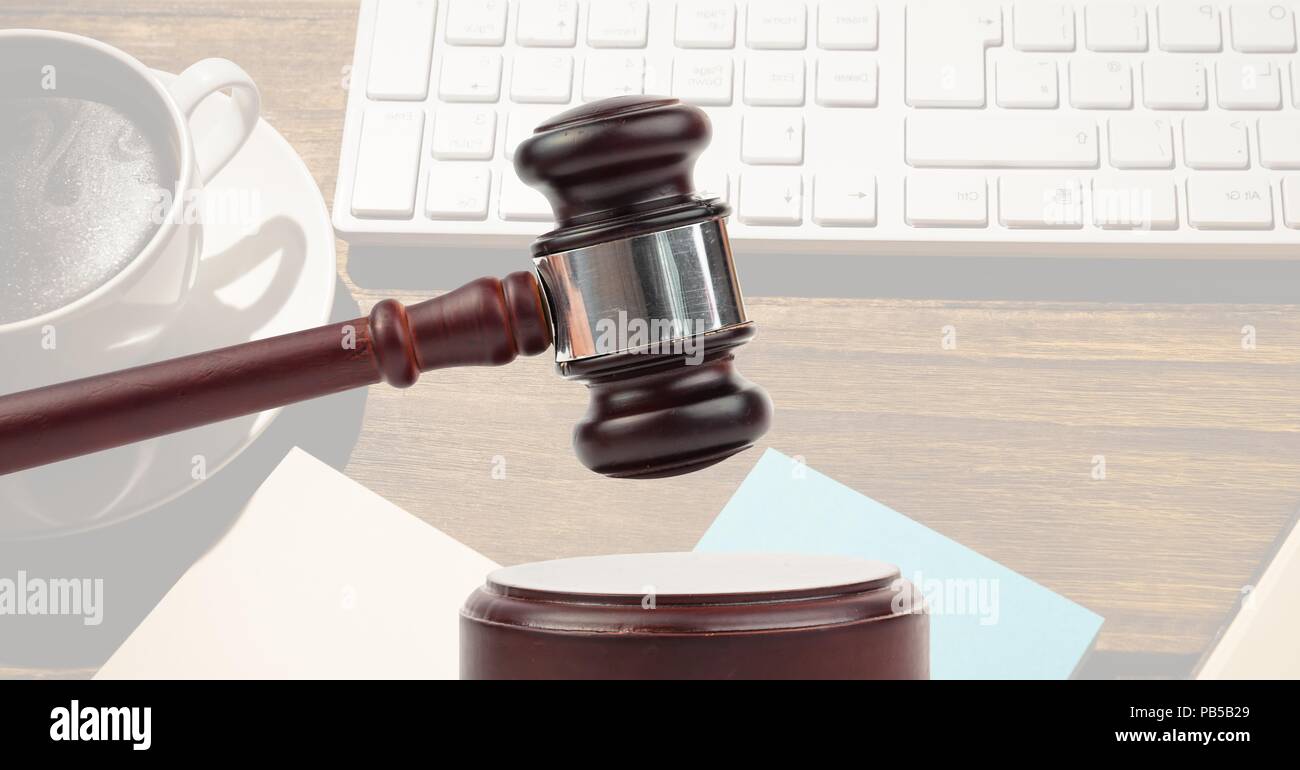 Gavel and desk with keyboard Stock Photo