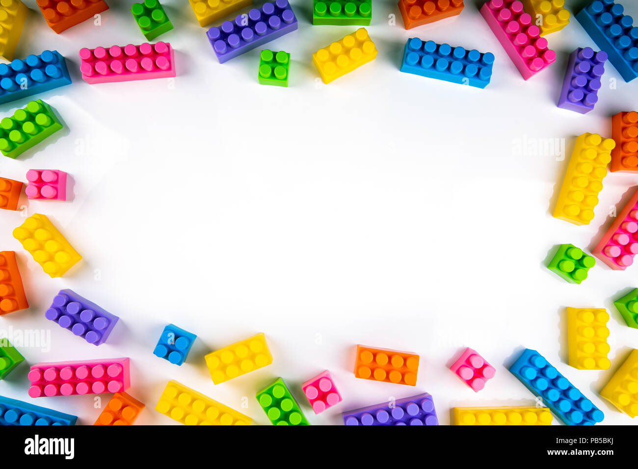 colorful building blocks with copy space in the middle. top view Stock Photo