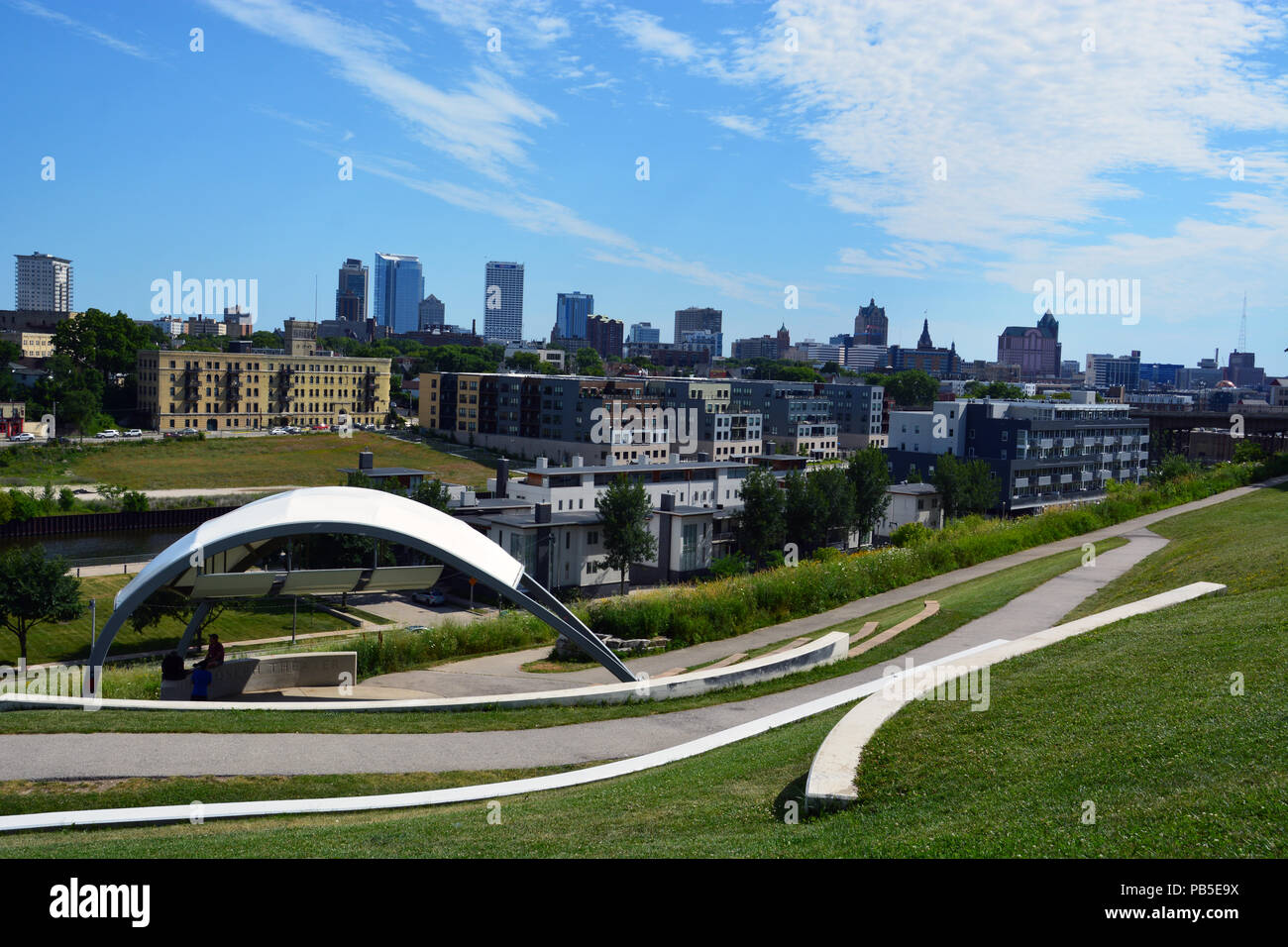 The Milwaukee skyline and Lower East Side neighborhood as seen from Kadish Park on top of Brewers Hill. Stock Photo
