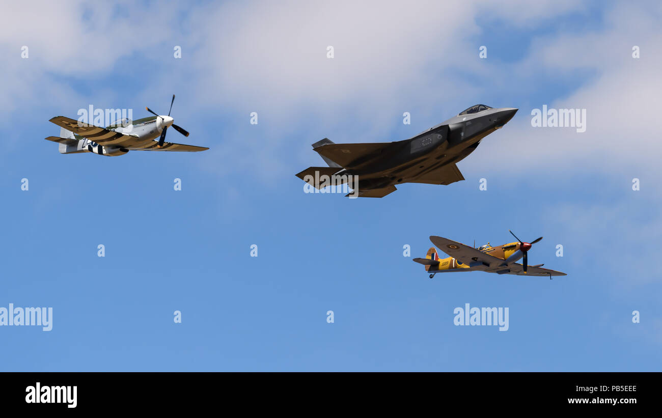 F35 Stealth Aircraft In Formation With Spitfire And Mustang Fighters At f35-stealth-aircraft-in-formation-with-spitfire-and-mustang-fighters-at