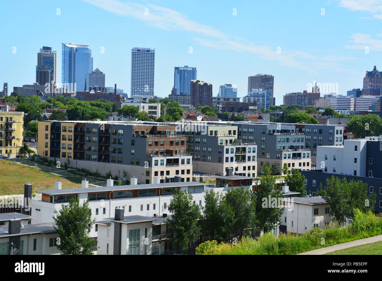 A rooftop view Milwaukee's Lower East Side neighborhood with the city skyline in the background from atop Brewers Hill Stock Photo