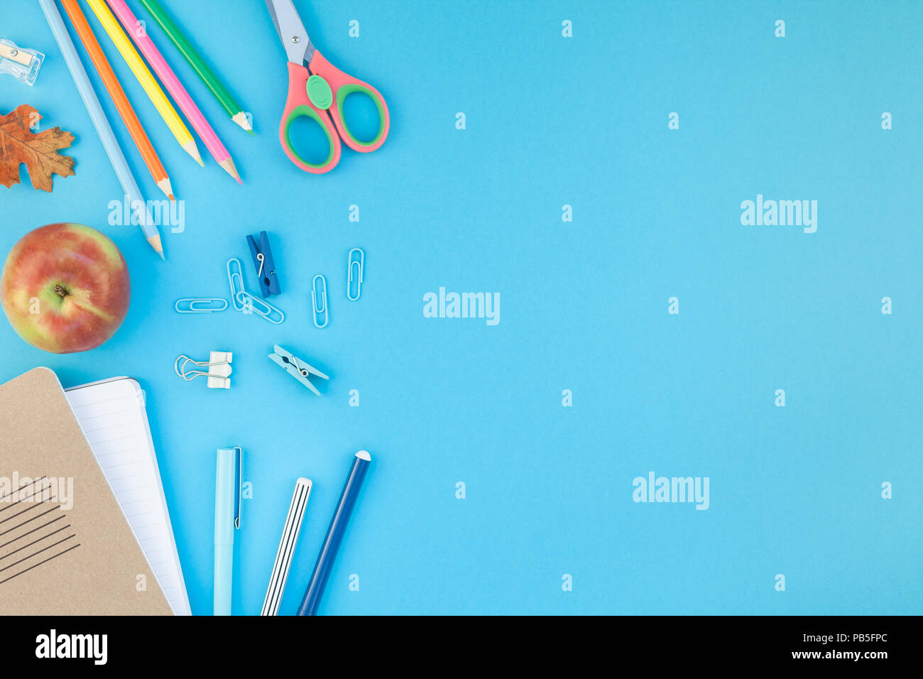 Creative flat lay top view back to school concept with alarm clock ...