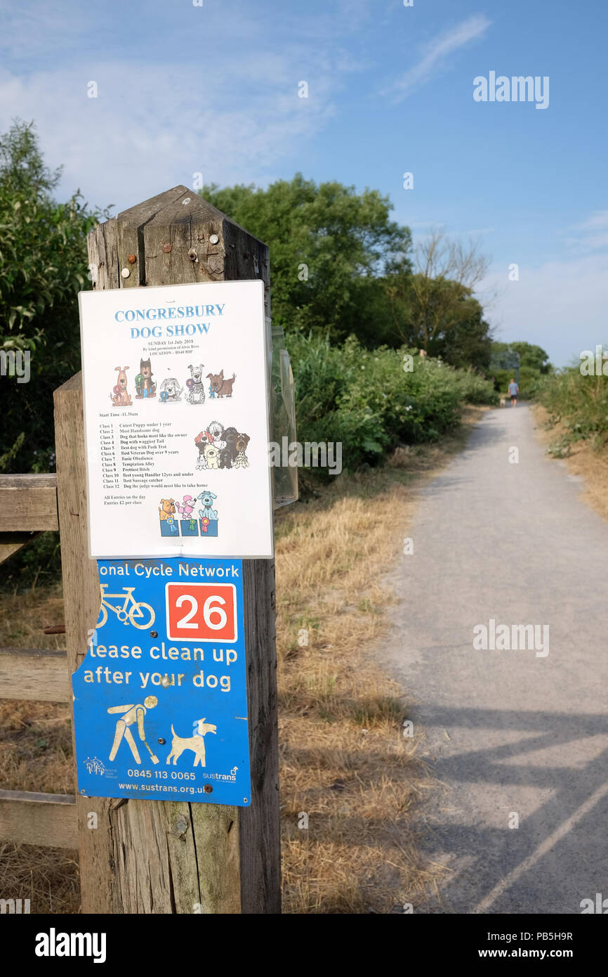 July 2018, Signs at the start of the National cycle route, number 26, together with dog hygiene sighs Stock Photo