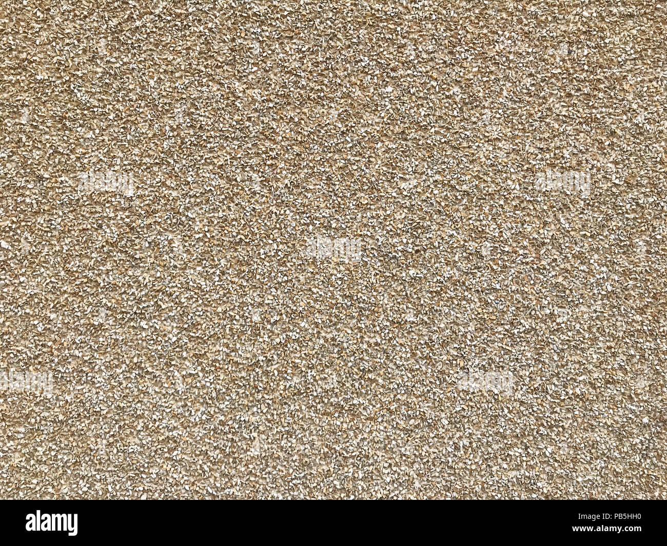 Wall of small stones, background or unusual texture Stock Photo - Alamy