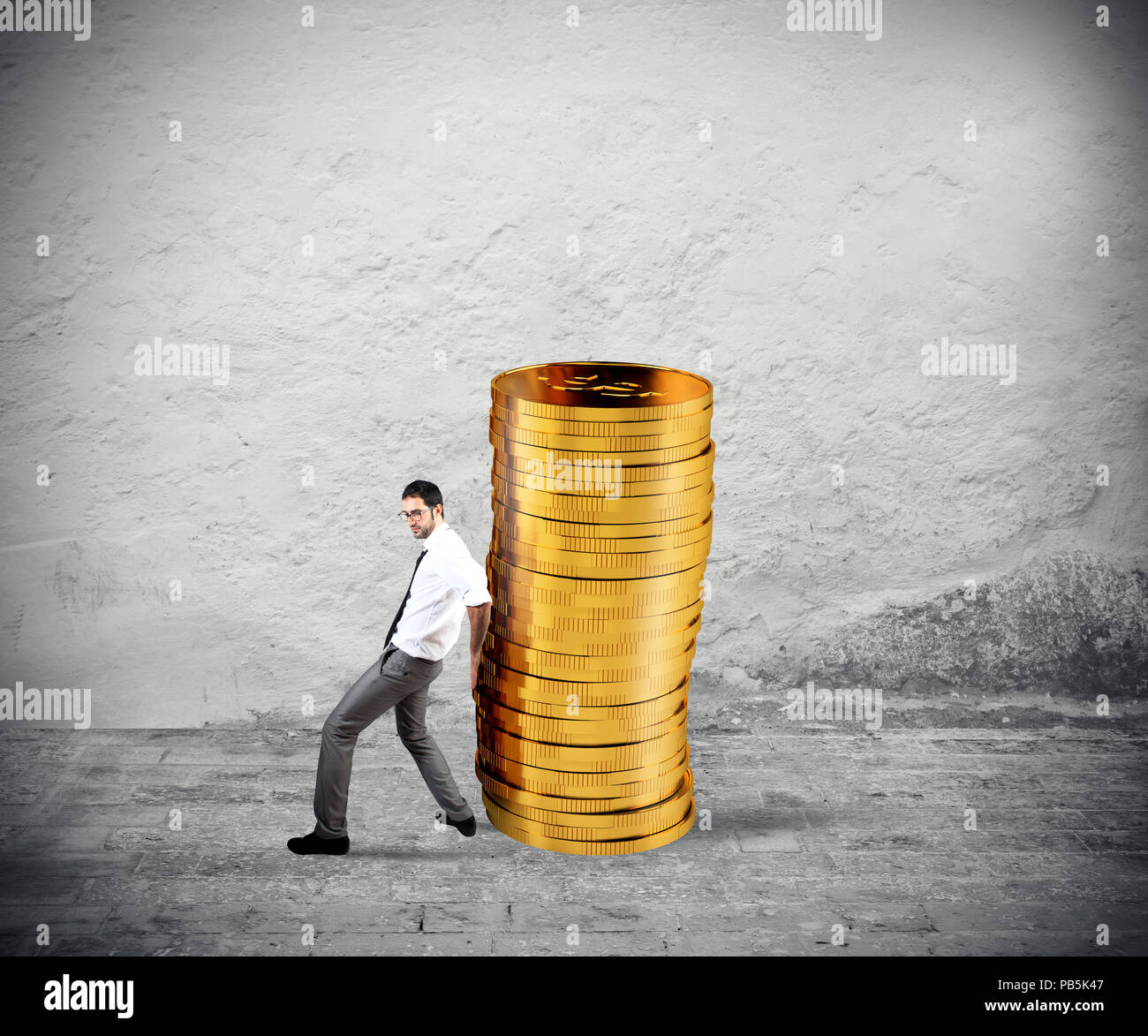 Businessman moves a pile of coins. concept of difficulty to saving money Stock Photo