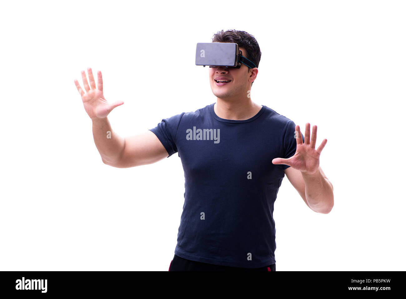Man playing with virtual reality glasses on white background Stock Photo