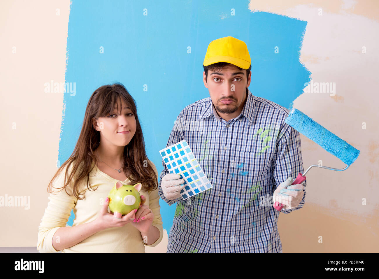 Piggy bank construction house renovation hires stock photography and