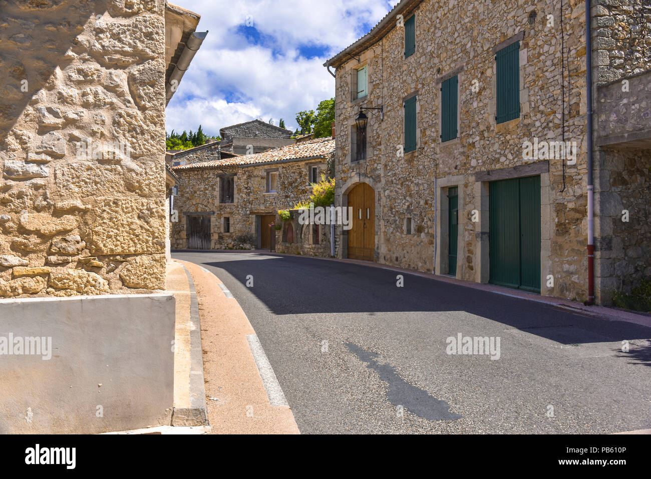 narrow street through the village Aurel, Provence, France, department Vaucluse, region Provence-Alpes-Côte d'Azur Stock Photo