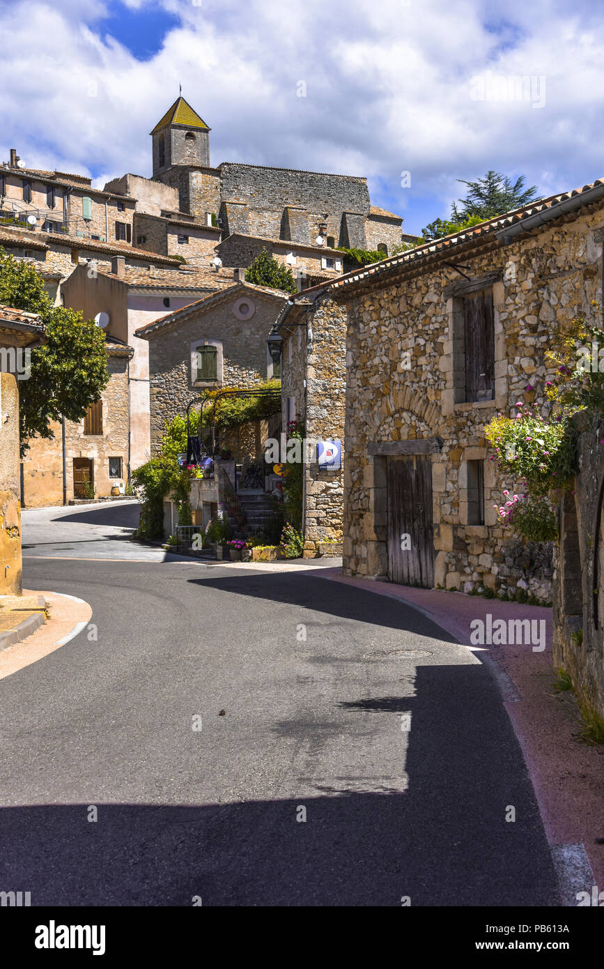 narrow street through the village Aurel, Provence, France, department Vaucluse, region Provence-Alpes-Côte d'Azur Stock Photo