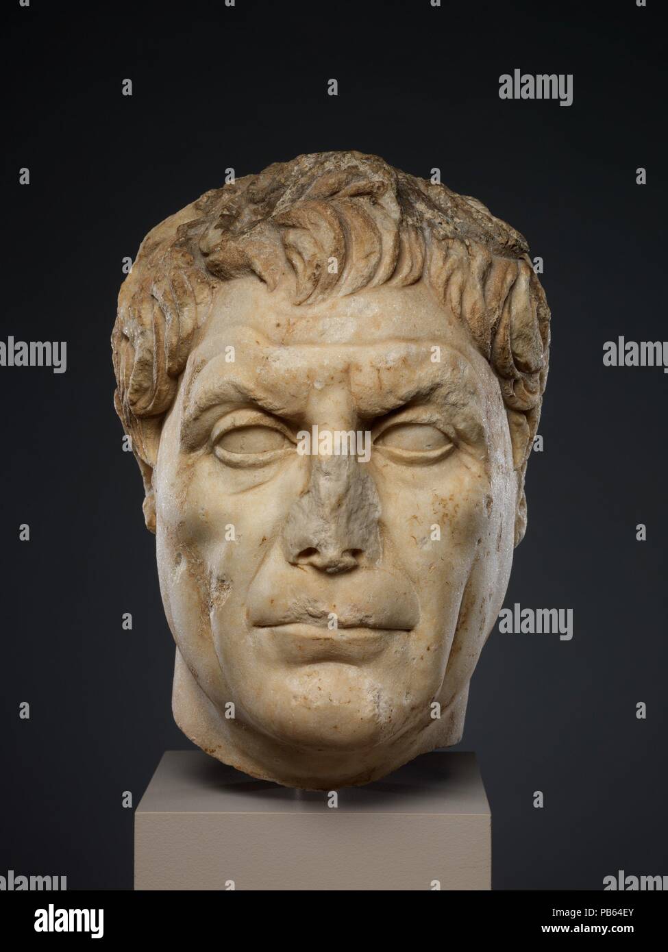 Marble portrait of a man. Culture: Roman. Dimensions: H. 11 3/16 in. (28.4 cm). Date: ca. A.D. 100.  Like this powerful image of a middle-aged man, many Flavian portraits show the same uncompromising representation of aging flesh that marked portraits of the Republican period. Museum: Metropolitan Museum of Art, New York, USA. Stock Photo