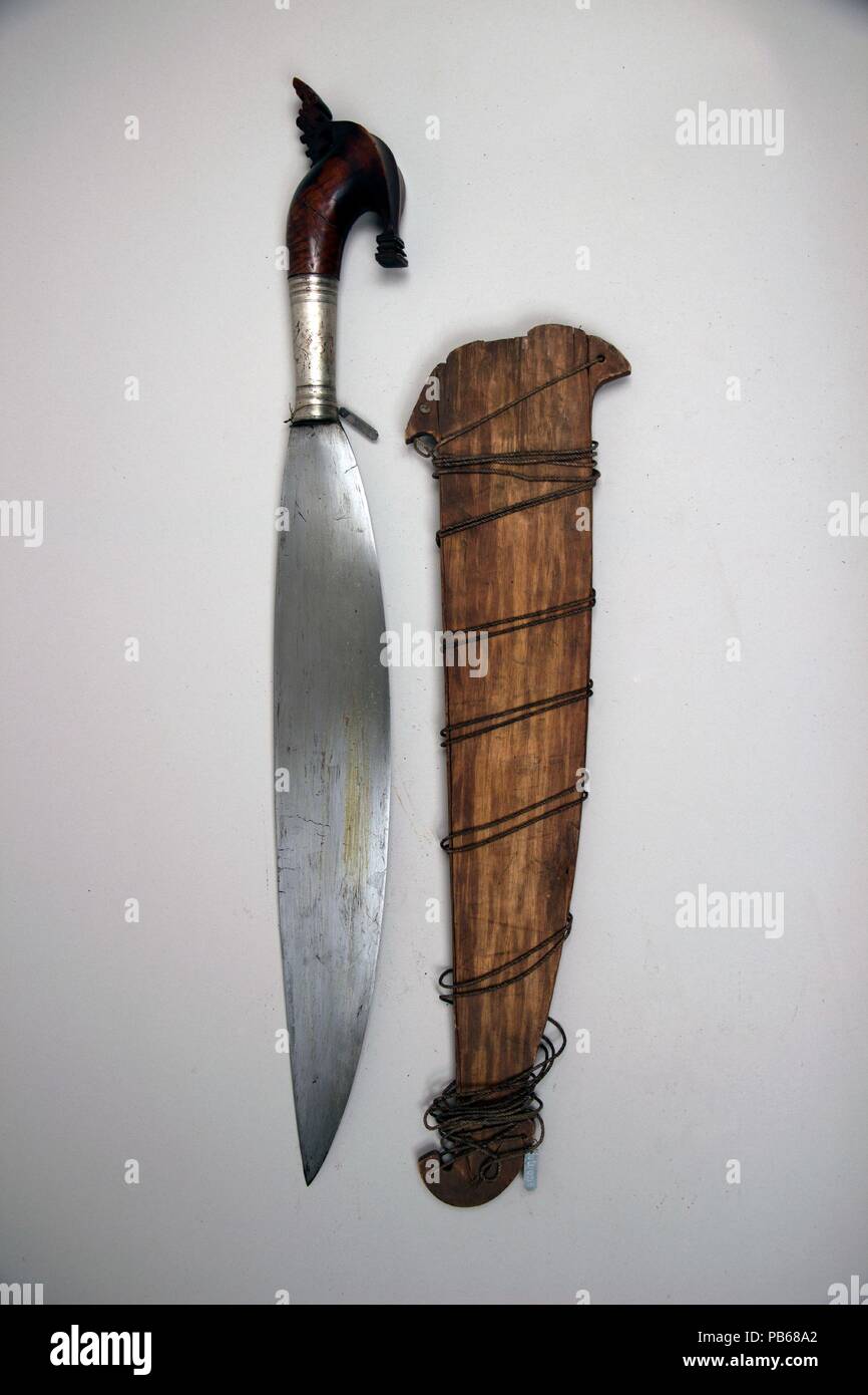 Knife (Barong) with Sheath. Culture: Philippine, Sulu. Dimensions: L. with sheath 26 3/8 in. (67 cm); L. without sheath 24 1/2 in. (62.2 cm); L. of blade 17 in. (43.2 cm); W. 2 3/4 in. (7 cm); Wt. 1 lb. 12.7 oz. (813.6 g); Wt. of sheath 5.5 oz. (155.9 g). Date: 18th-19th century. Museum: Metropolitan Museum of Art, New York, USA. Stock Photo