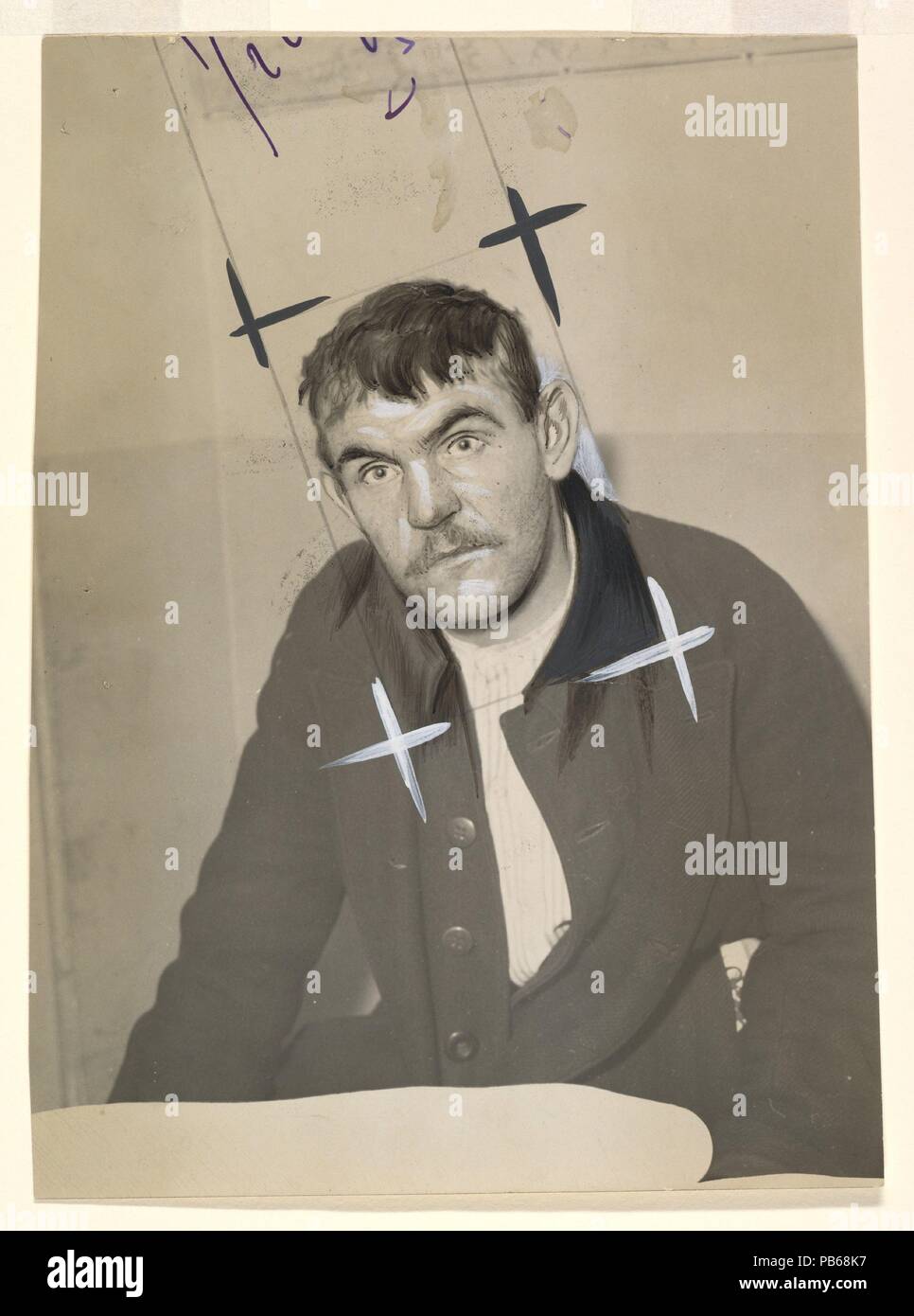 Marius Bourotte. Artist: Unknown (French). Dimensions: 11.6 x 16.2 cm. (4  9/16  x 6  3/8  in.). Publisher: Le Petit Parisien (French, active 1876-1944). Date: 1929.  These photographs of thieves and assassins were heavily retouched with ink and gouache to facilitate their reproduction in illustrated newspapers and magazines. Although they were not conceived as typological studies, the cropping and retouching deliberately intensified their sinister aspect, producing caricatures of criminality that satisfied the sensationalism of the picture press. Museum: Metropolitan Museum of Art, New York,  Stock Photo