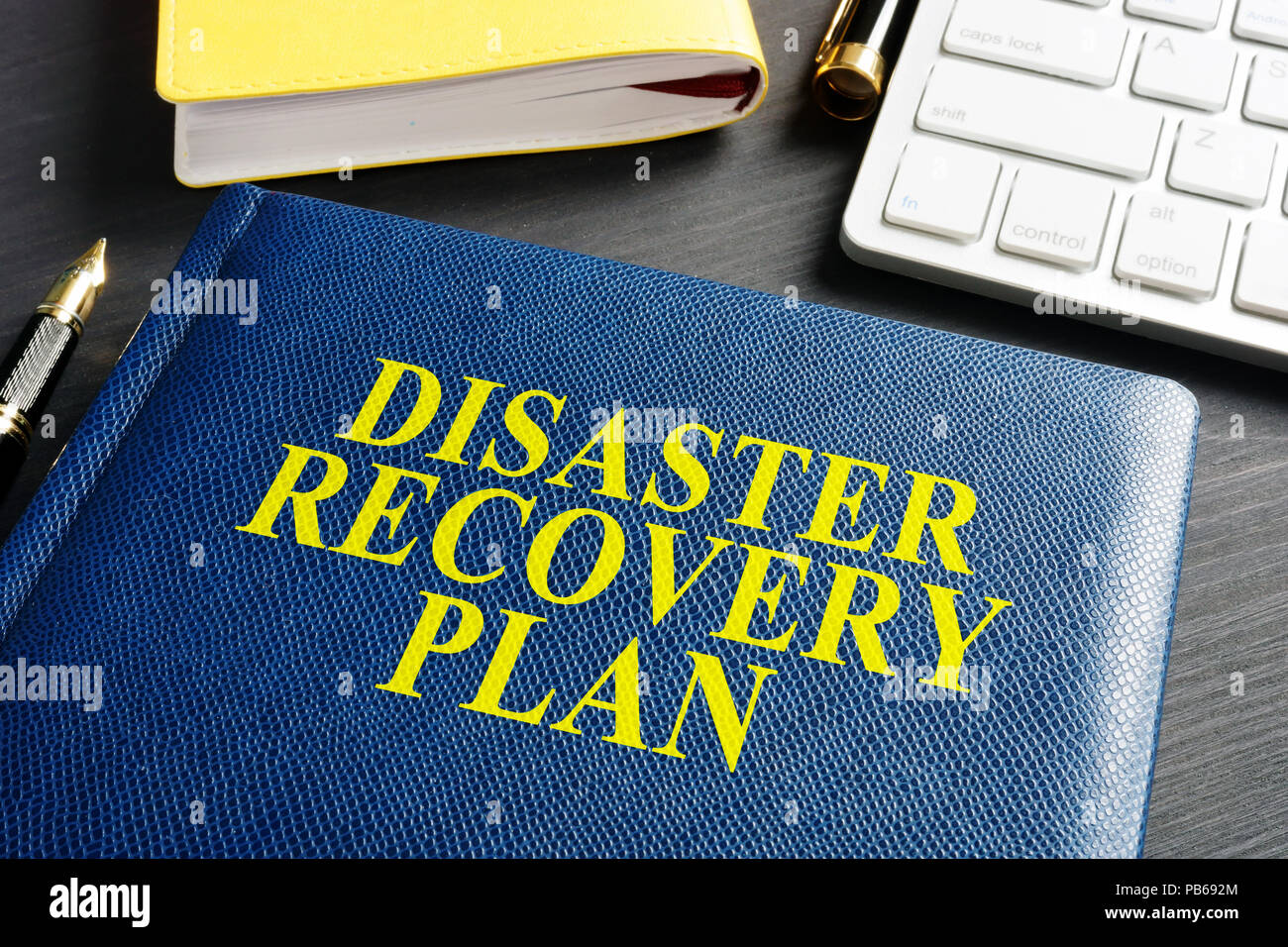 Disaster Recovery Plan on an office table. Stock Photo