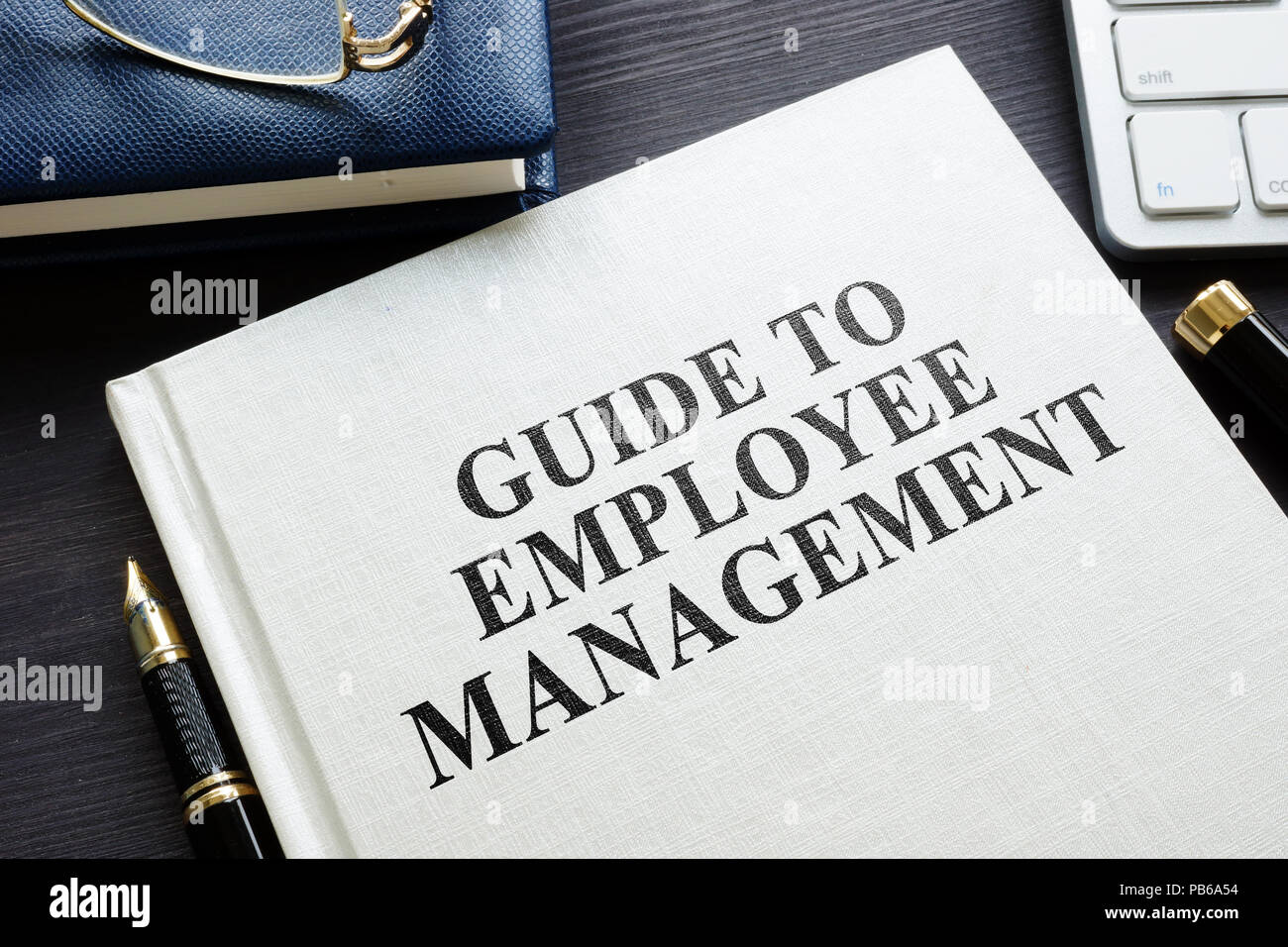 Guide to Employee Management in the office. Stock Photo