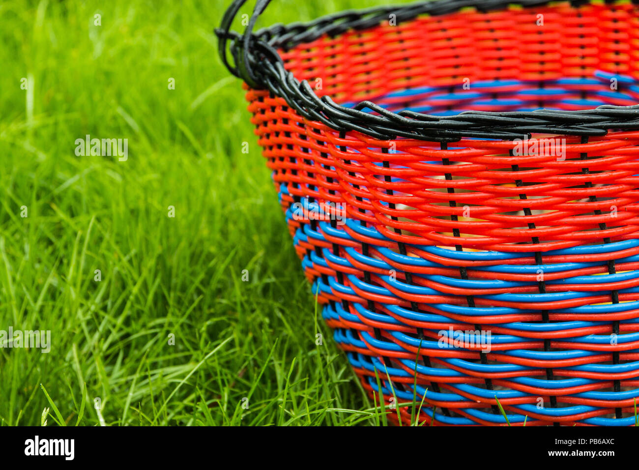wicker empty basket for products on grass Stock Photo