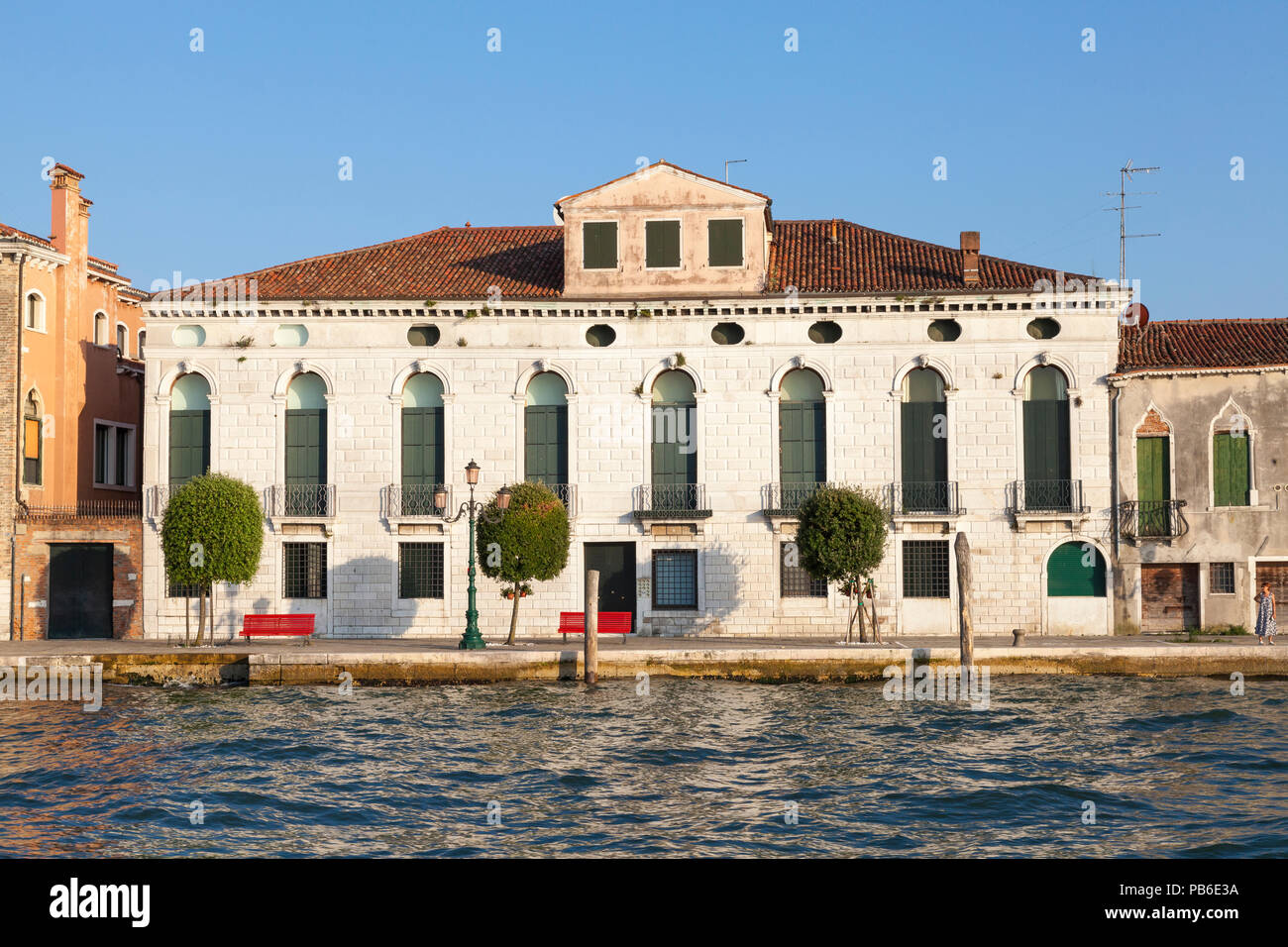 Fondamenta San Giovanni, Giudecca Island, Giudecca Canal, Venice, Veneto, Italy, at sunset, dusk, evening Stock Photo