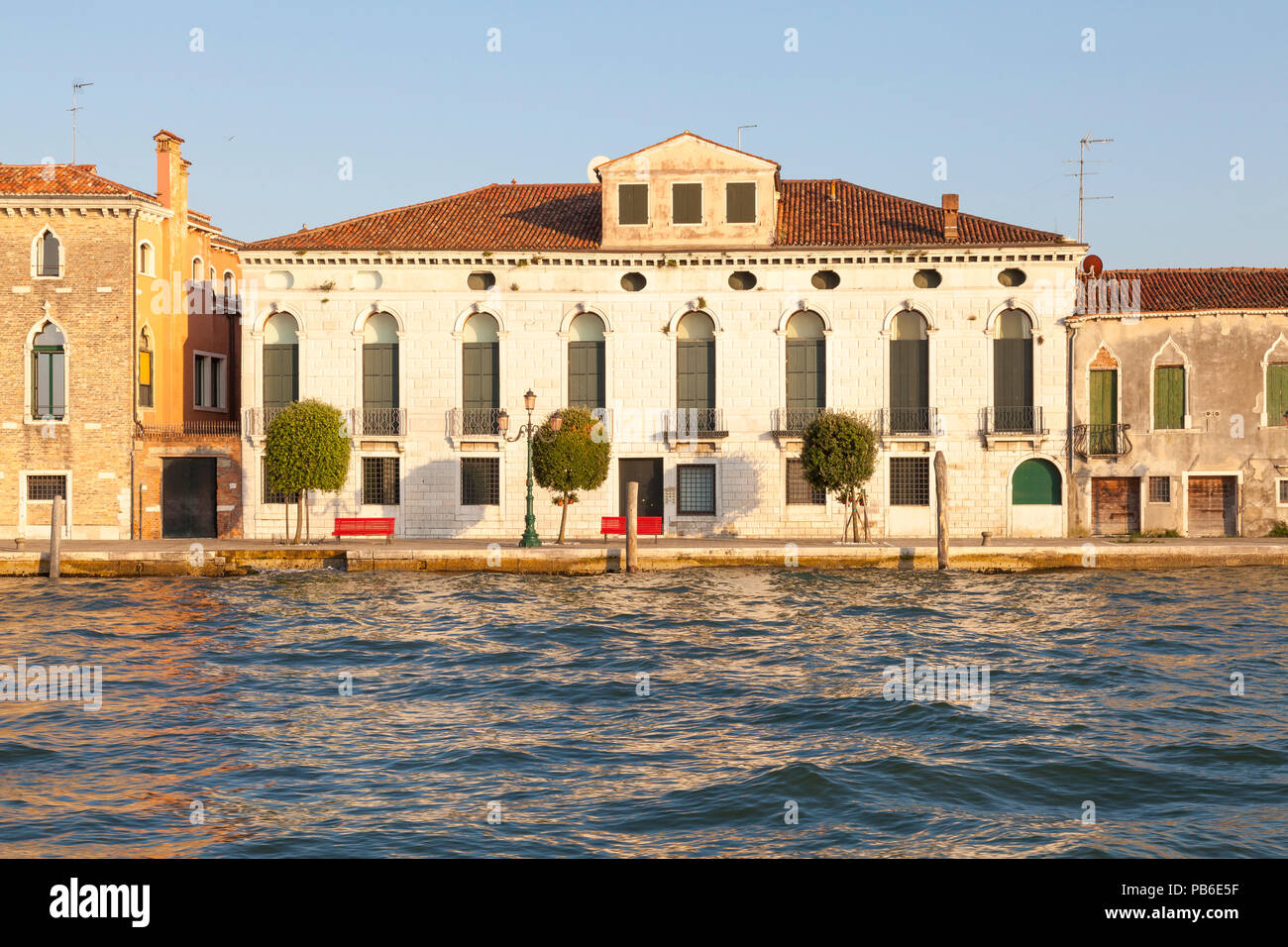 Fondamenta San Giovanni, Giudecca Island, Giudecca Canal, Venice, Veneto, Italy, at sunset, dusk, evening Stock Photo