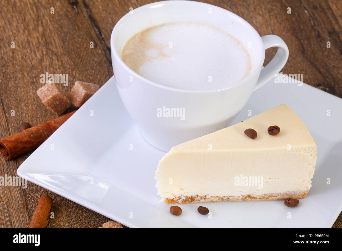 Coffee capuccino with cheesecake Stock Photo - Alamy