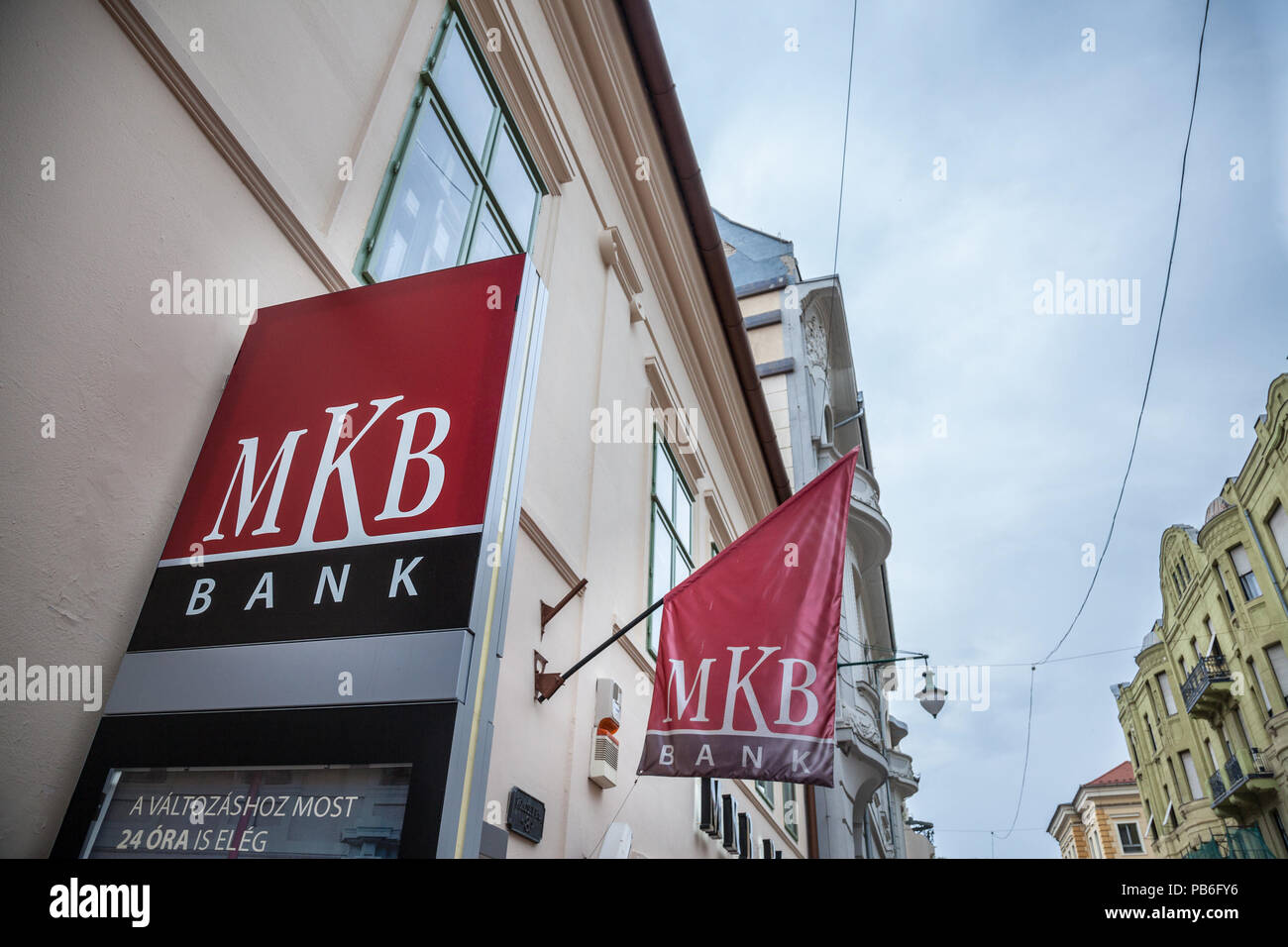 SZEGED, HUNGARY - JULY 4, 2018: MKB Bank logo on their main office for Szeged in the city center. MKB is one of the biggest domestics banks of Hungary Stock Photo