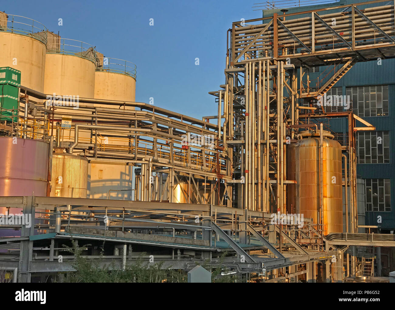 Chemical factory pipework, Lever Brothers Ltd, Persil soap powder, Warrington Bank Quay, Cheshire, North West England, UK Stock Photo