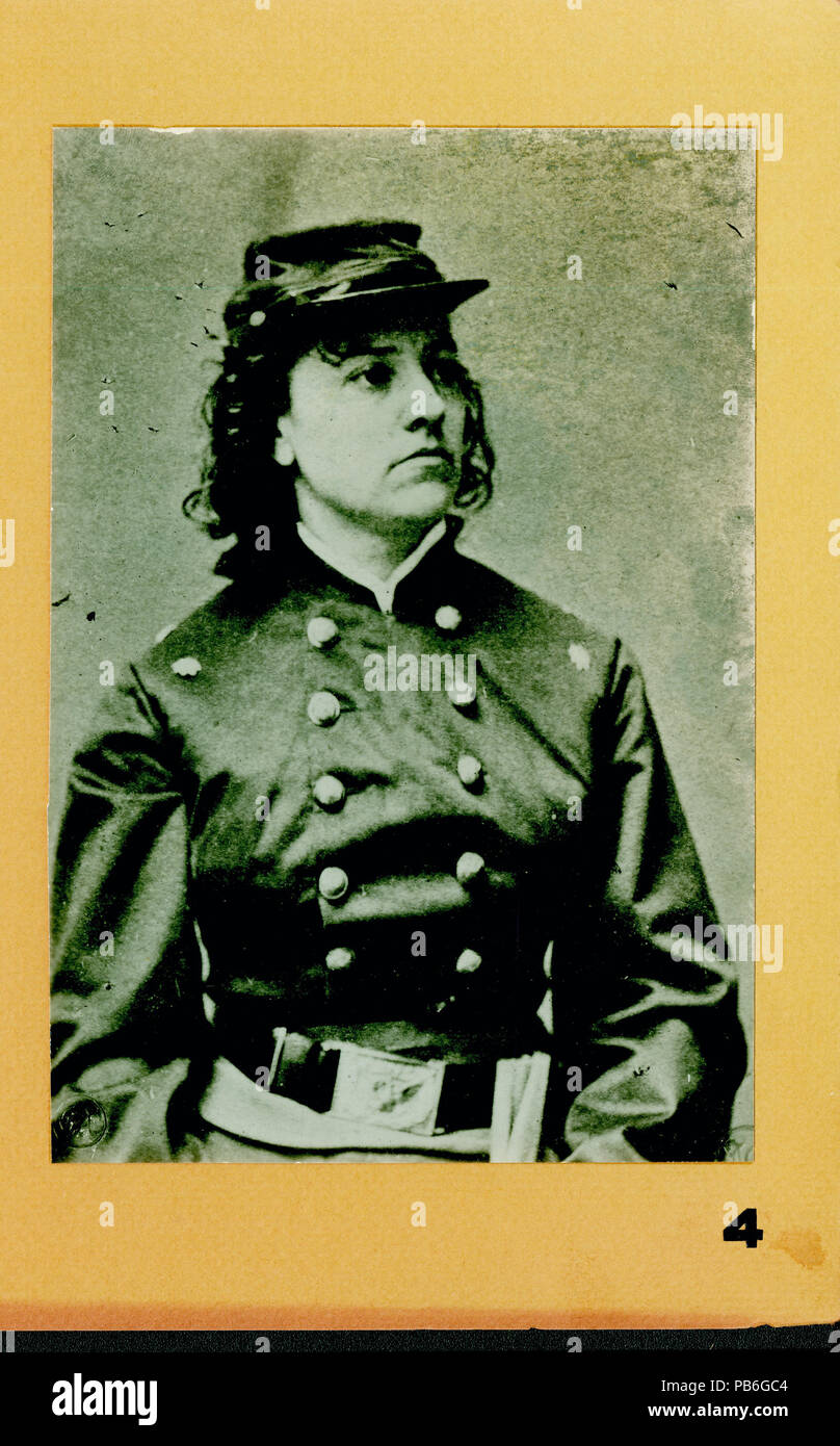 . English: Two portraits juxtaposed on cardboard. Photograph on the left is a bust portrait of a woman in a dress, and the photograph on the right is a half-length portrait of a woman in uniform. Pauline Cushman was a Union spy and scout who was captured and sentenced to death by Confederate officials, but was rescued at Shelbyville by Gen. Rosecrans's Army. She was given an honorary title of major and is in uniform posing with a sword in this image. Title: Pauline Cushman (Union). between 1861 and 1865 1174 Pauline Cushman (Union) Stock Photo