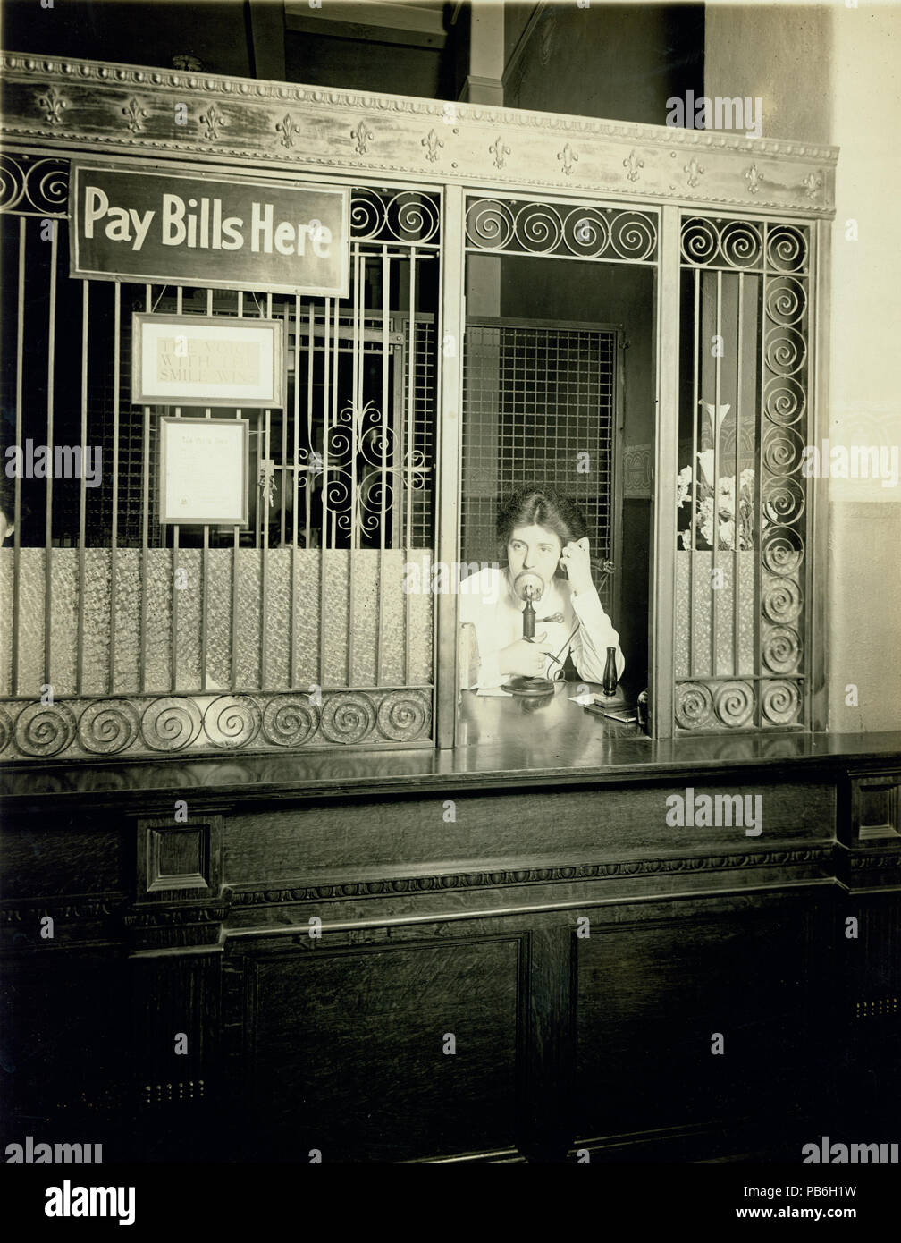 1603 Teller at payment window of Southwestern Bell Telephone Company Stock Photo Alamy
