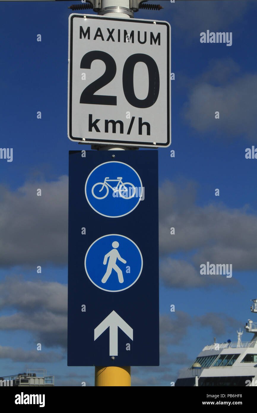 Speed limit and direction sign Stock Photo - Alamy