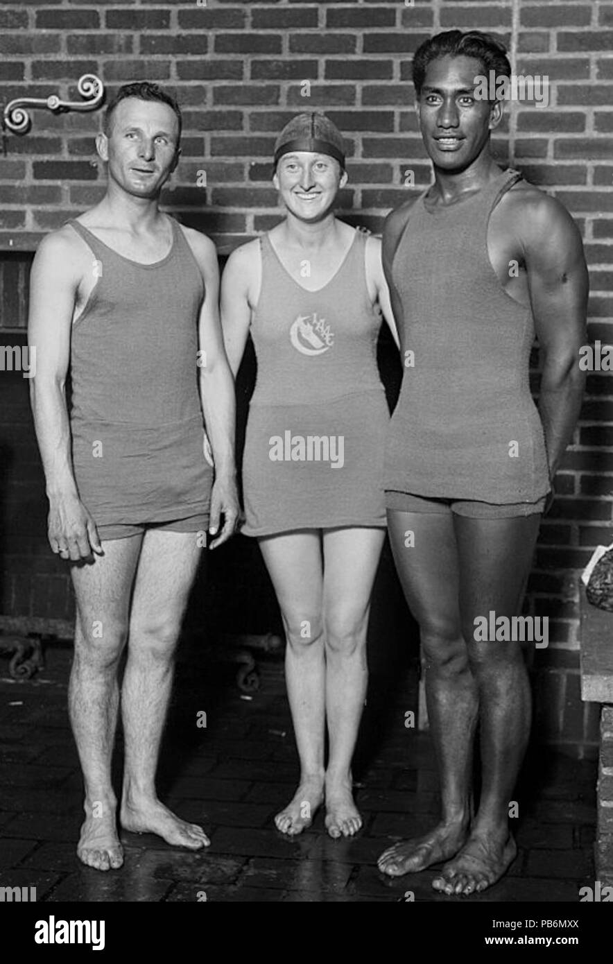 . From left to right, American swimming champions Ludy Langer (1893 - 1984), Claire Galligan and Duke Kahanamoku (1890 - 1968, right), circa 1920. circa 1920 958 Ludy Langer, Claire Galligan, Duke Kahanamoku c1920 Stock Photo