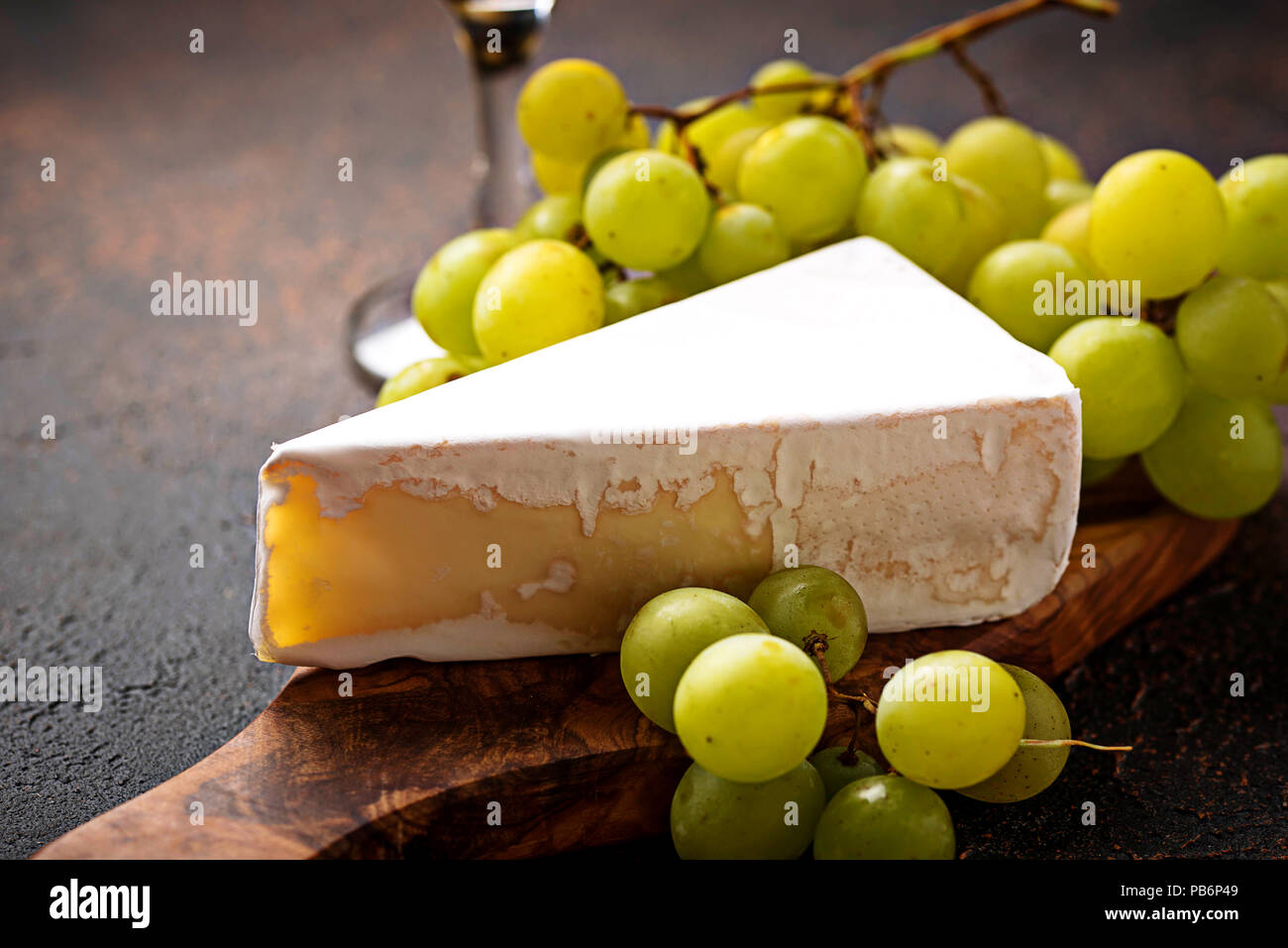 Cheese brie, grape and wine Stock Photo Alamy