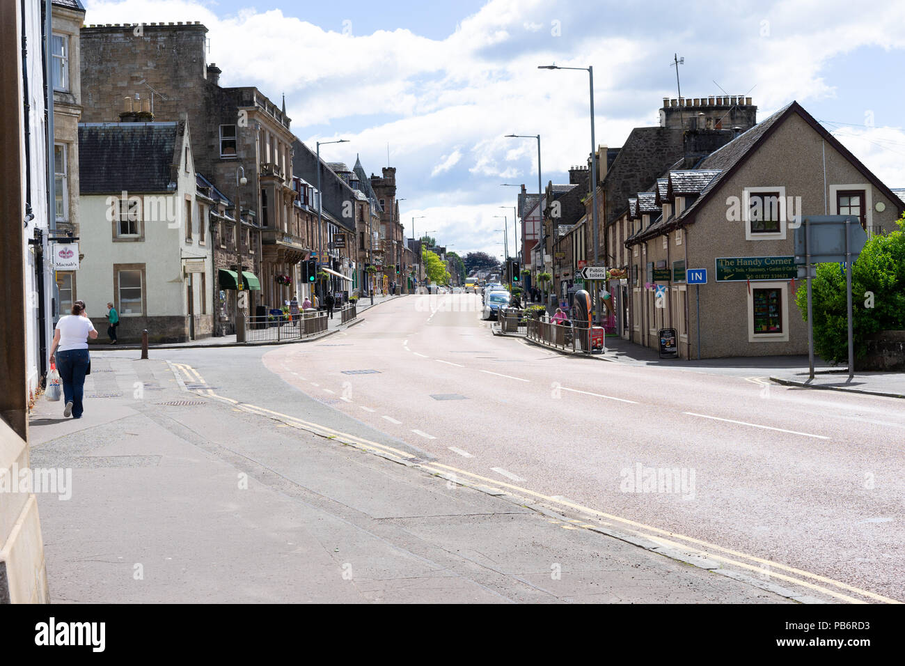 The main road (A84) going through the small Scottish town of Callander, Stirling, Scotland, UK. Stock Photo