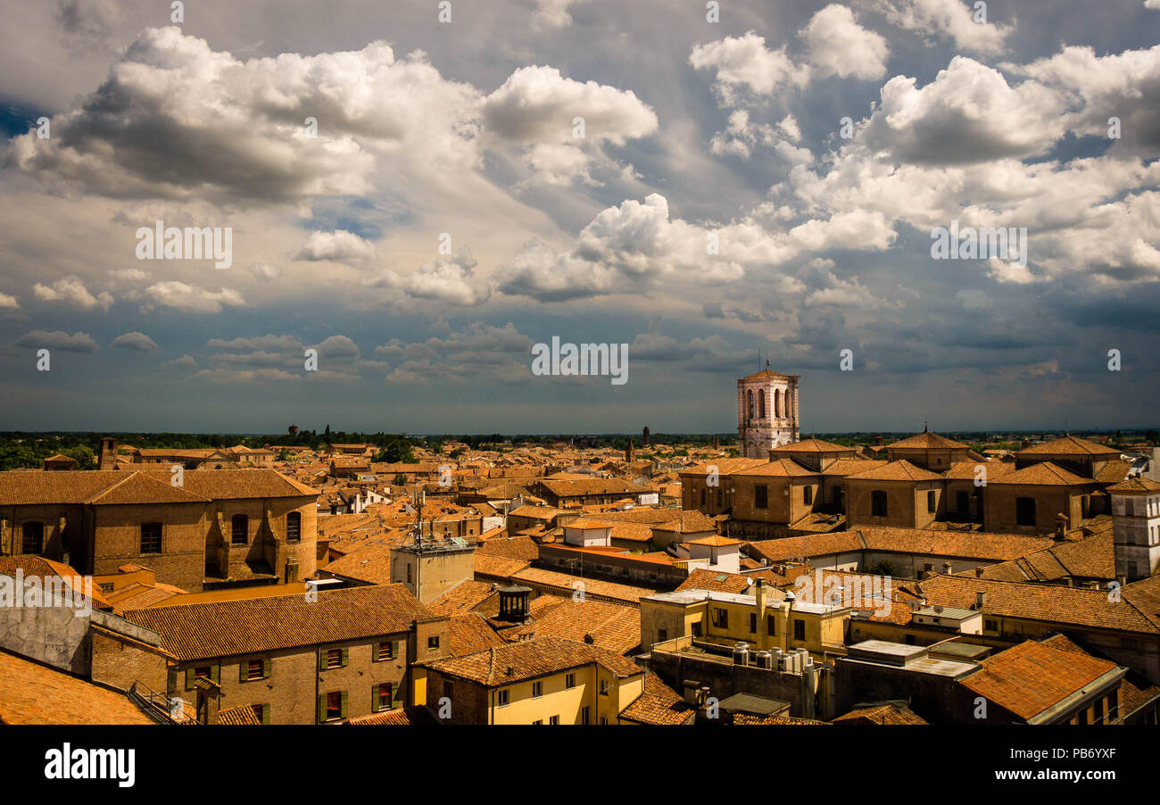 View over the red roofs of Ferrara, Italy during an approaching thunderstorm Stock Photo