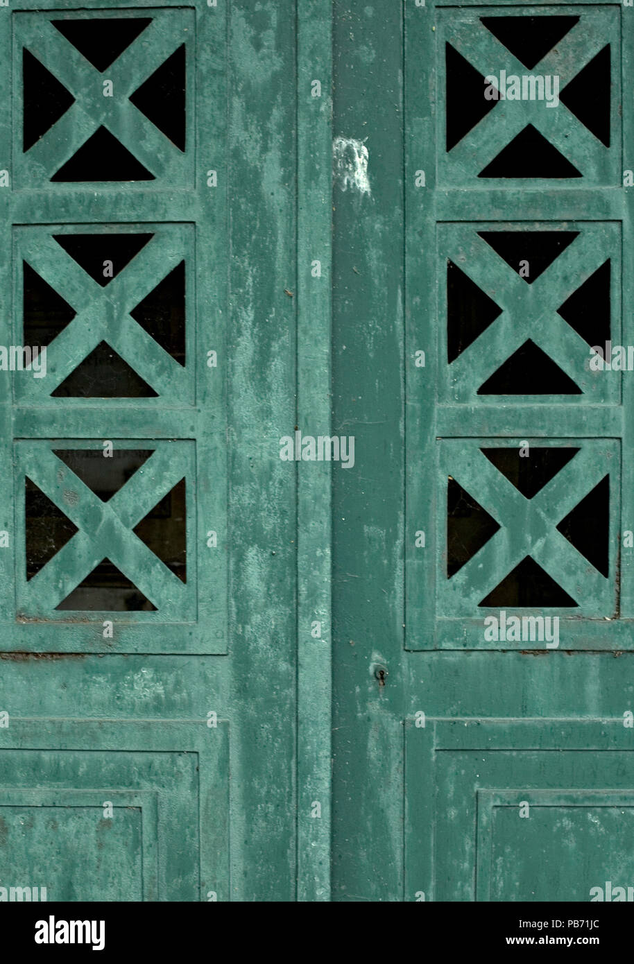 Green crypt door in Montmartre cemetary, Paris, France Stock Photo