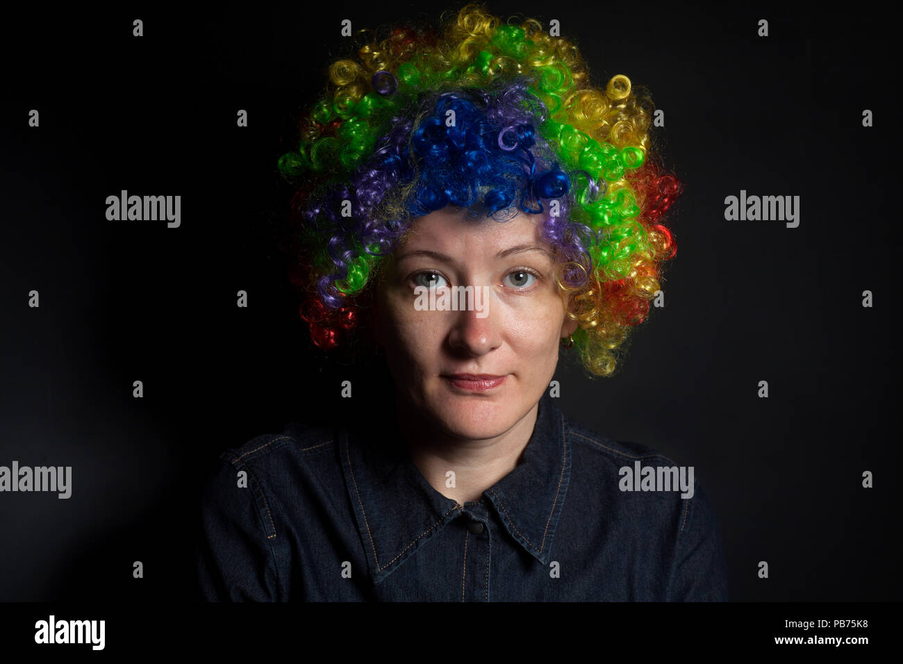 Funny clown woman isolated on black background Stock Photo - Alamy