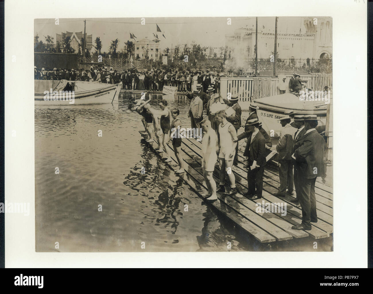 1569 Start of the 100 yards Swimming on Back championship at the 1904 Olympics - Stock