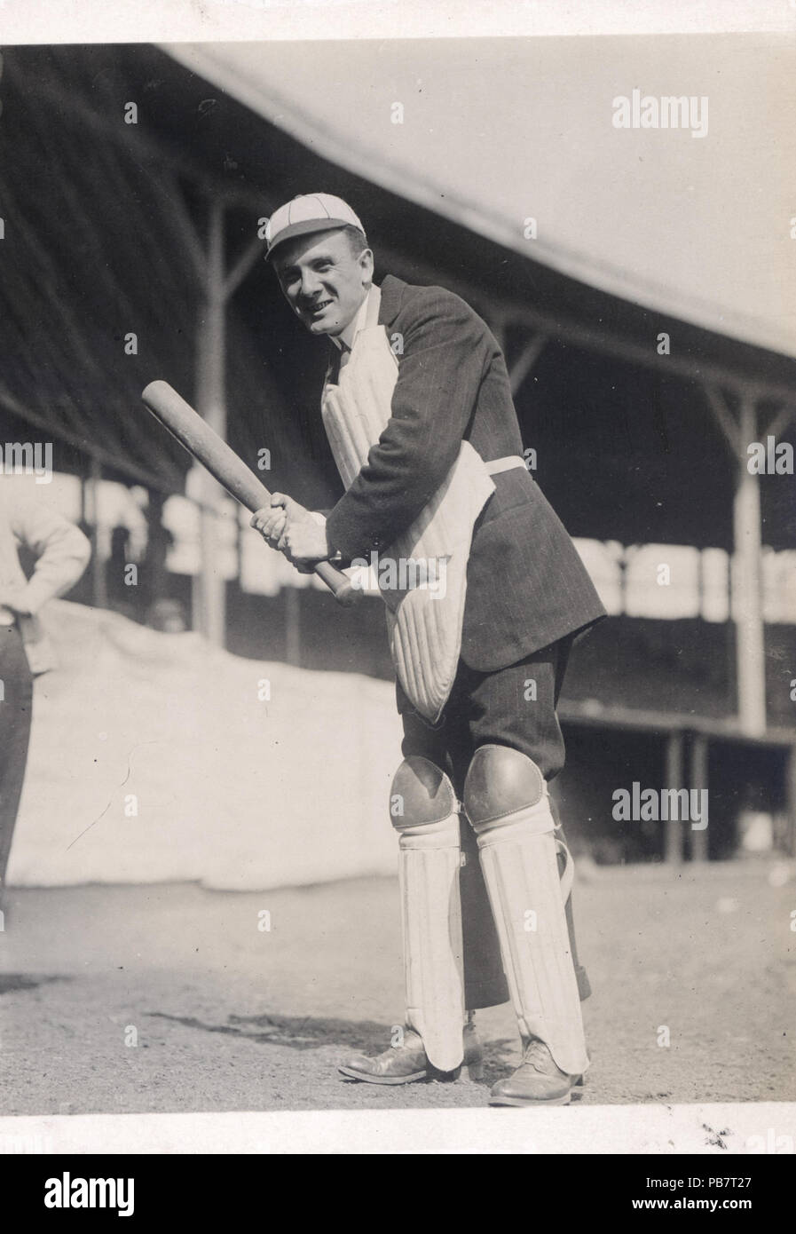 1787 Umpire with bat in pre-game clowning. Opening Day, Robison Field. Cardinals v. Pirates Stock Photo