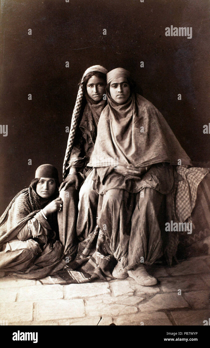 1745 Three women tiredly look at Antoin Sevruguin as he photographs them in the late 19th century. Stock Photo