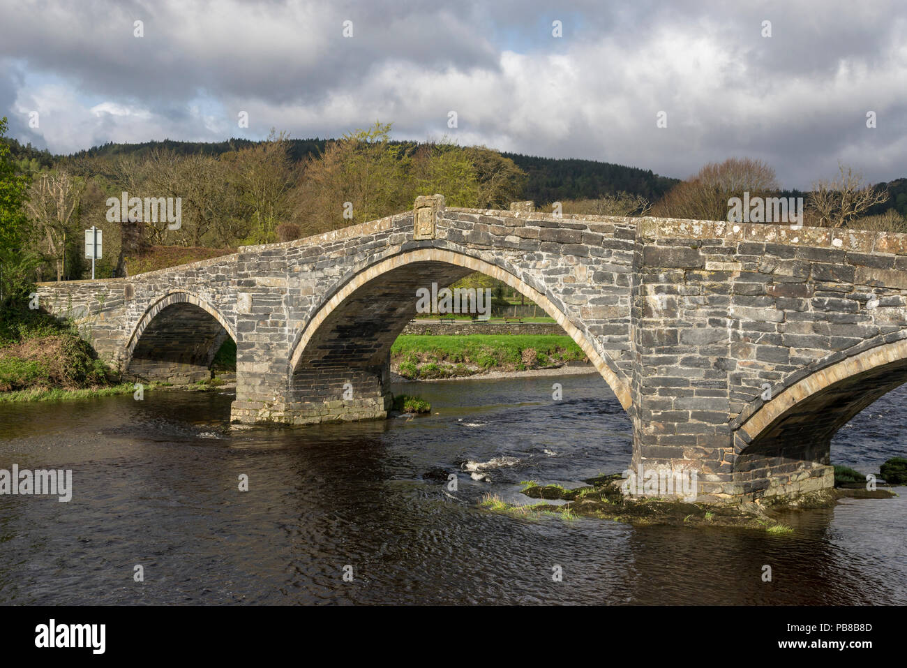 Pont Fawr bridge over the river Conwy, Llanrwst, North Wales, UK. A sunny spring day in this