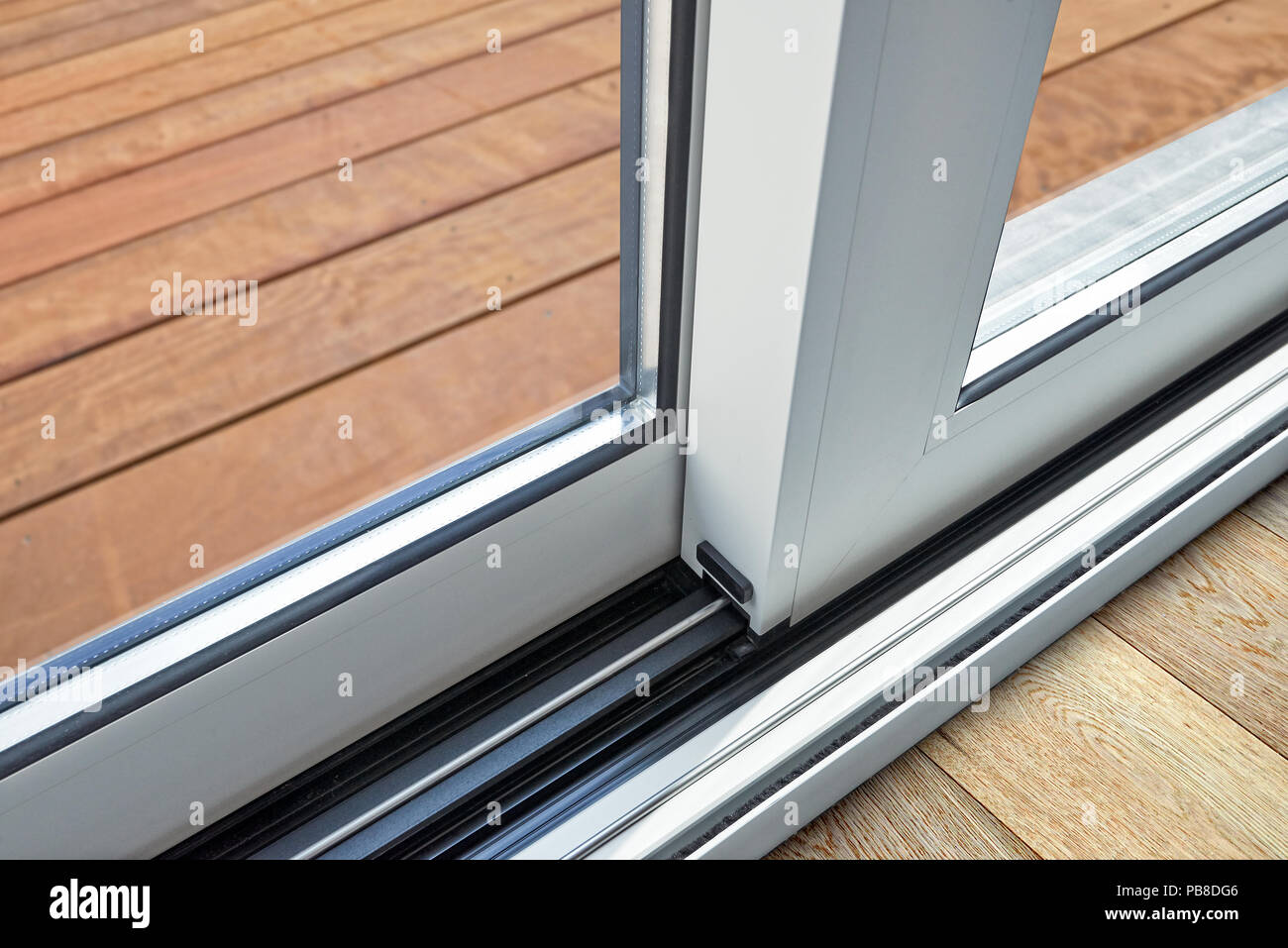 Sliding glass door detail and rail embed in floor Stock Photo Alamy
