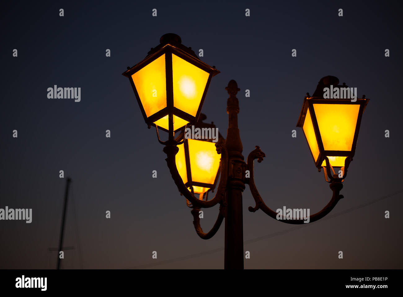 Beautiful ancient lamp at night, close-up. Bulgaria, Nessebar Stock Photo -  Alamy