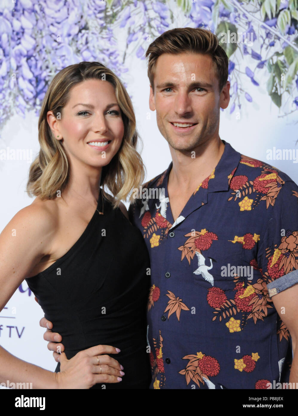 Beverly Hills, California, USA. 26th July, 2018. Actor Andrew Walker (R)  and wife Cassandra Troy attend Hallmark Channel and Hallmark Movies &  Mysteries Summer 2018 Television Critics Association Press Tour Event on