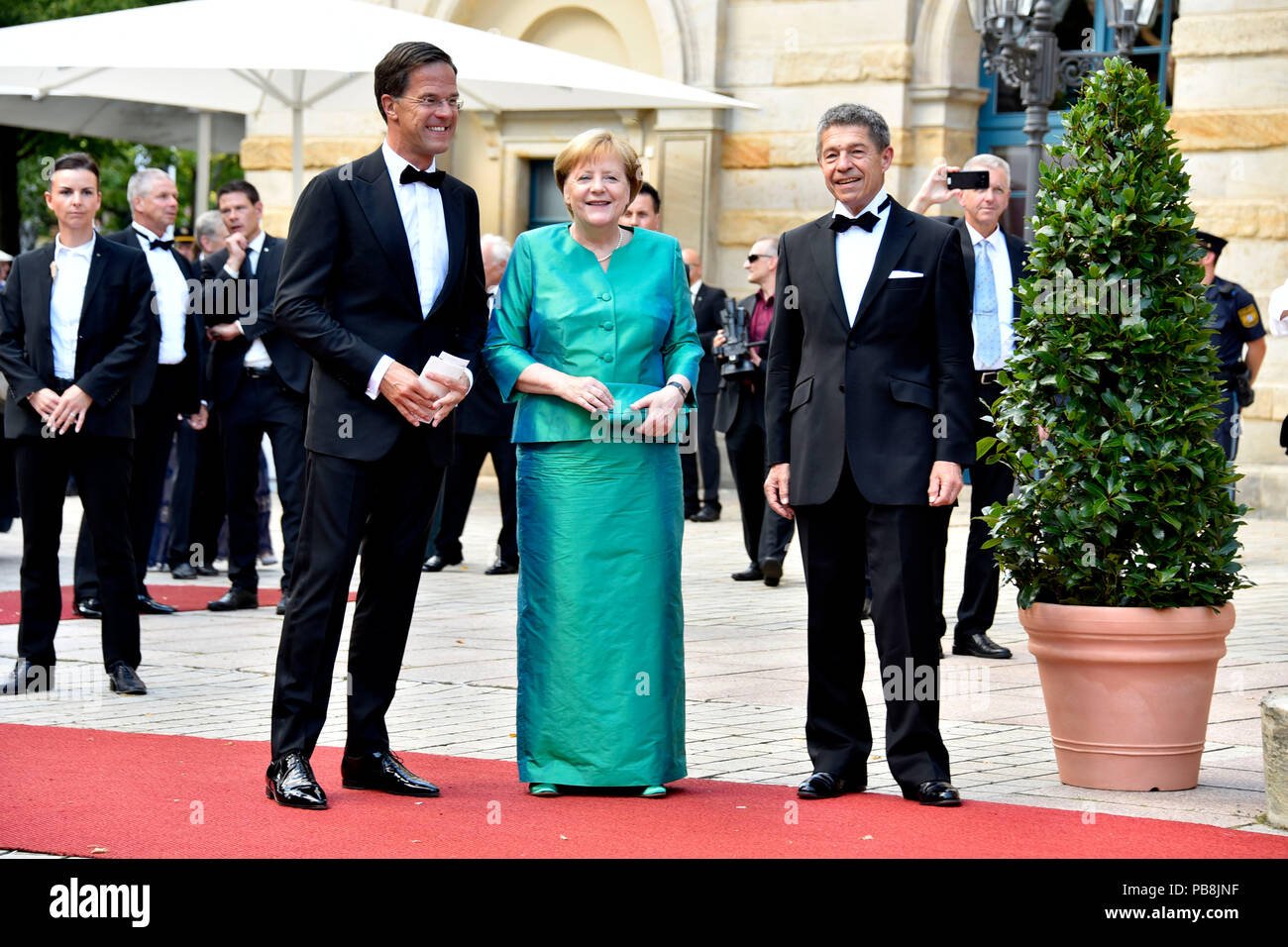 Mark Rutte, Angela Merkel and husband Joachim Sauer at the inauguration ...