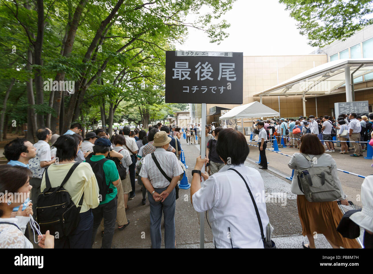 Tokyo, Japan. 27th July, 2018. Visitors line up outside the Ueno Royal Museum to see ''The Miracle of M.C. Escher Prints from The Israel Museum, Jerusalem'' exhibition on July 27, 2018, Tokyo, Japan. The exhibition introduces a selection of 150 works (selected from The Israel Museum) of the Dutch graphic artist Maurits Cornelis Escher at Ueno Royal Museum until July 29. (Photo by Rodrigo Reyes Marin/AFLO) Credit: Aflo Co. Ltd./Alamy Live News Stock Photo