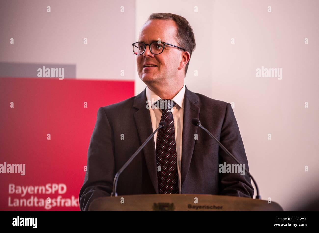 Munich, Bavaria, Germany. 27th July, 2018. Captain Claus Peter Reisch of the Mission Lifeline NGO received the Europa-Preis (Europe Award) at Bavaria's Landtag (Parliament) for his humanitarian engagement in the Mediterranean in rescuing hundreds migrants in danger of drowning. Reisch was recently arrested in Malta, facing various charges related to the use of the vessel in rescue activities. He is currently out on bail and has surrendered his passport while awaiting trial. According to the UN, some 1,500 migrants are estimated to have died while trying to cross the Mediterranean, with so Stock Photo