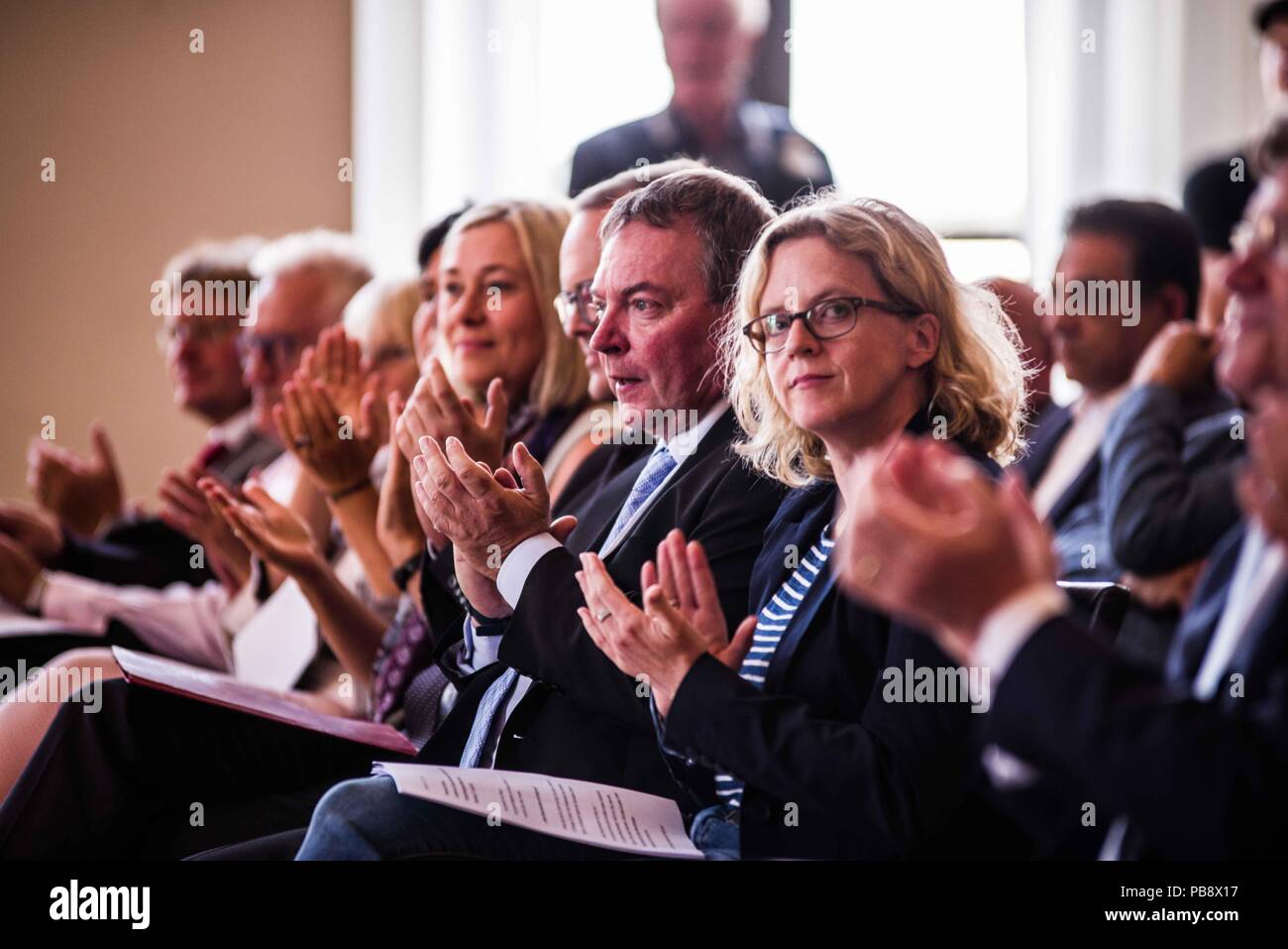 Munich, Bavaria, Germany. 27th July, 2018. Captain Claus Peter Reisch of the Mission Lifeline NGO received the Europa-Preis (Europe Award) at Bavaria's Landtag (Parliament) for his humanitarian engagement in the Mediterranean in rescuing hundreds migrants in danger of drowning. Reisch was recently arrested in Malta, facing various charges related to the use of the vessel in rescue activities. He is currently out on bail and has surrendered his passport while awaiting trial. According to the UN, some 1,500 migrants are estimated to have died while trying to cross the Mediterranean, with so Stock Photo