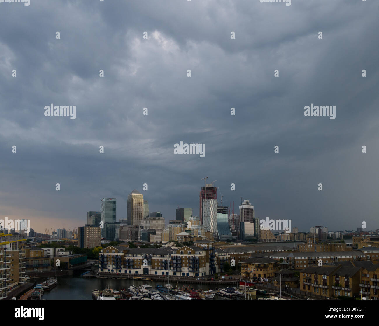 London, UK. 27th July 2018. Lightning during a thunderstorm over Canary Wharf during the UK's longest heatwave since 1976. Gill Prince/Alamy Live News Stock Photo